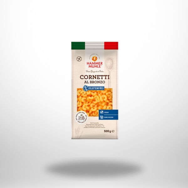 Hammermühle Cornetti al Bronzo Packung Hammermühle Cornetti al Bronzo glutenfreie Mais‑Reis‑Pasta (500 g) in Hörnchenform, Schriftzug „glutenfrei, vegan, laktosefrei“ und „al bronzo“.