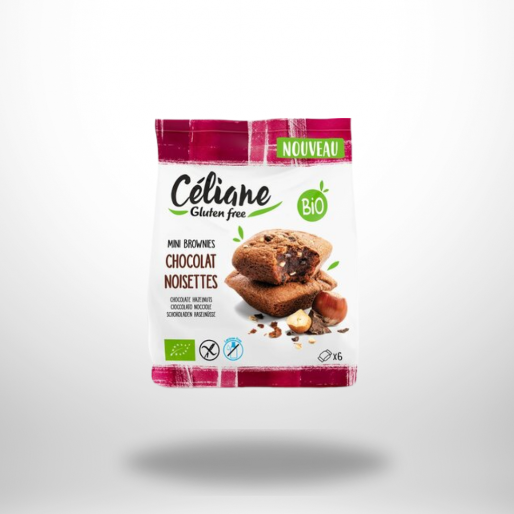 Pink-weißer Beutel „Céliane Gluten free Mini Brownies Chocolat Noisettes“ mit zwei schokoladigen Brownies und Haselnuss-Stückchen.