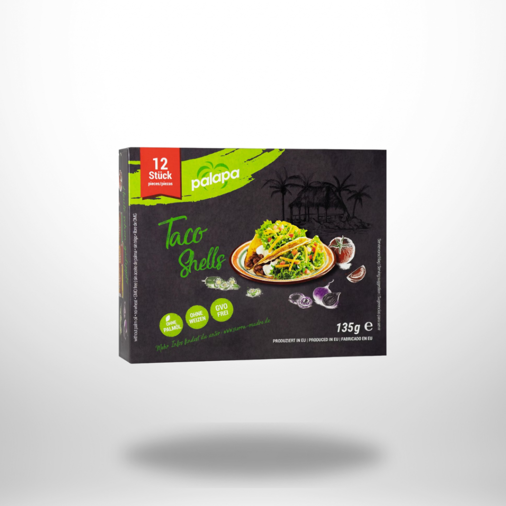 Schwarze 135-g-Faltschachtel „Palapa Taco Shells“ mit Teller gefüllter Tacos; Icons „ohne Palmöl“, „ohne Weizen“, „GVO-frei“.